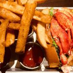 Pub lobster roll with fries at Oxford Casino Hotel in Maine
